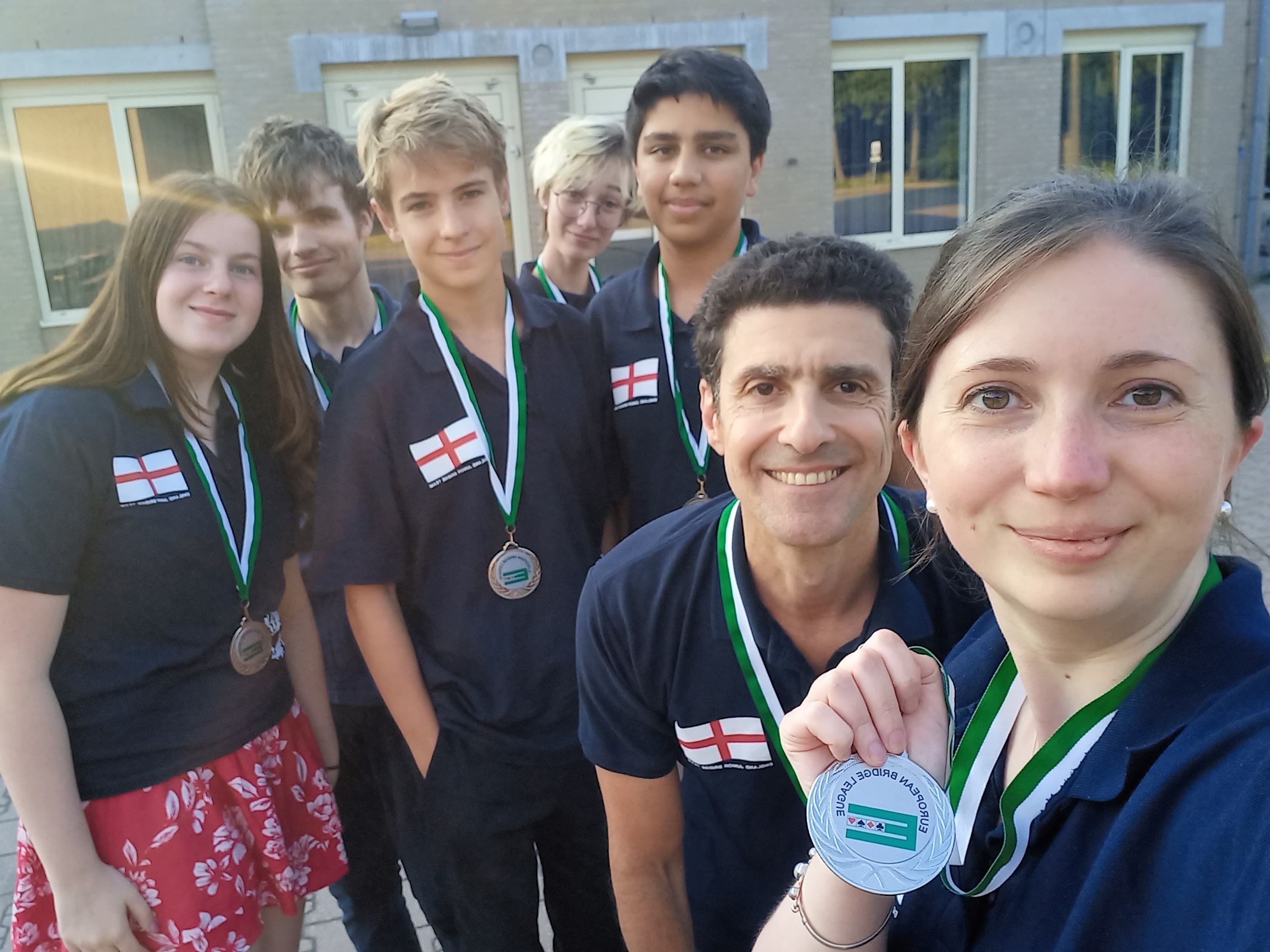 EBU Under 16s Youth Team all smiling at the camera and showing off their silver medals